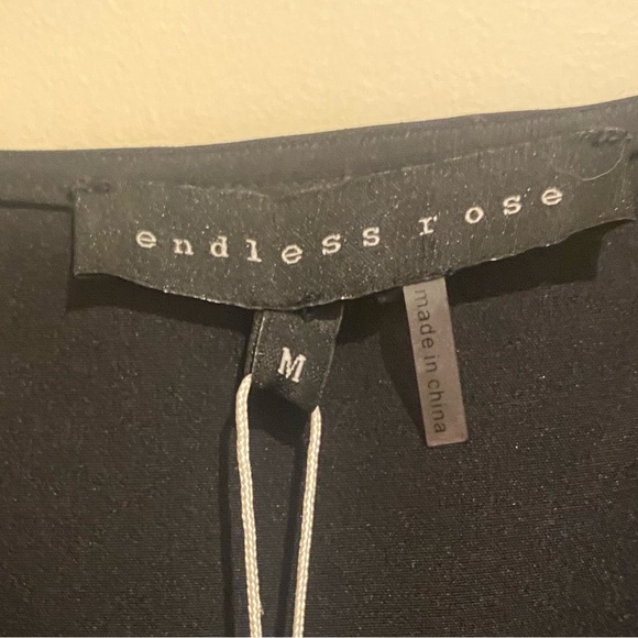 Black V Neck Mini Dress with Ruffle Detail - Picture 5 of 7